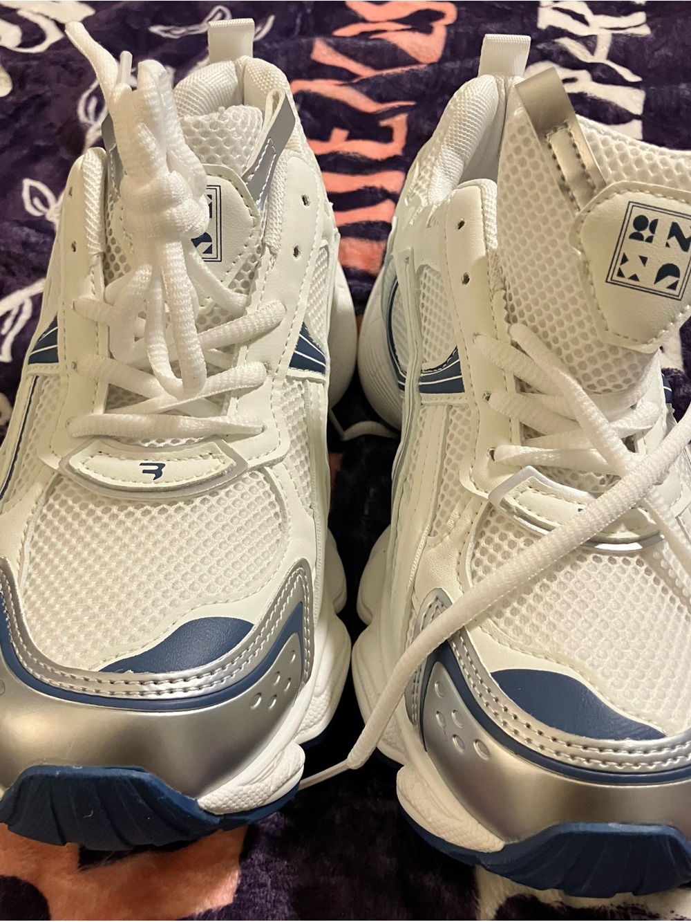 Kids White and Silver Athletic Sneakers with Blue Accents
